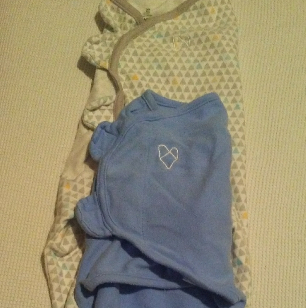 2 SwaddldMe Swaddles